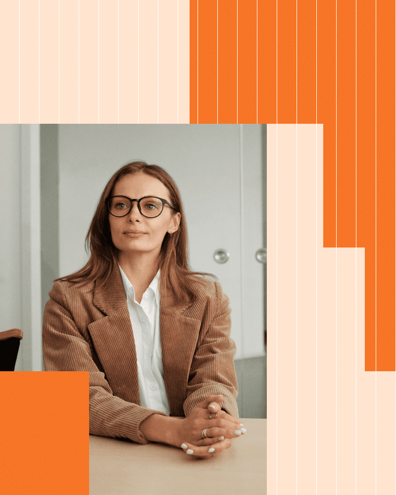 woman in office setting orange bento